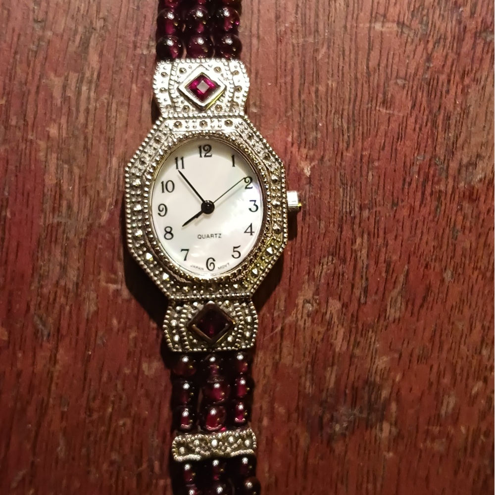 Silver and Red Ornate Watch with Crystal Accents